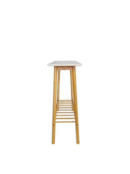 Bamboo side table with white top from the side, showing its shallow depth